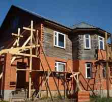 Как да се наложи една дървена къща с тухла